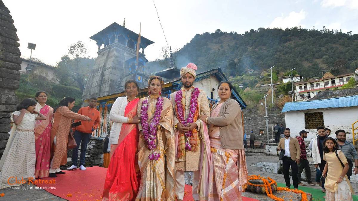 Bride and groom in traditional attire at their Triyuginarayan temple wedding ceremony